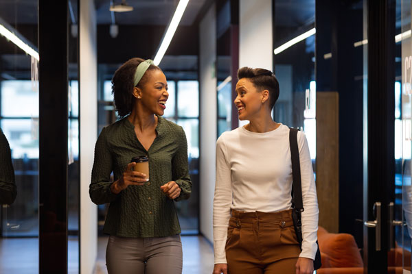 multiracial businesswomen talking